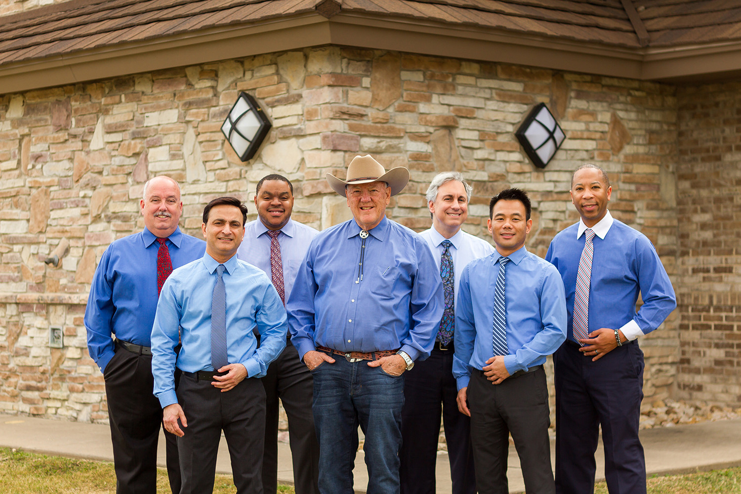 Doctors of Cardiology Partners Mansfield TX, including James A Richardson MD, Alan M Taylor MD, Shoaib H Saya MD, Michael D Venincasa MD, Levi A Rice DO, Danny Le DO, and Curtiss R Moore DO, standing together showcasing their cardiology expertise.