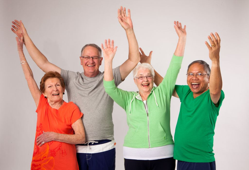 alt text: Participants attending an educational workshop on aging.