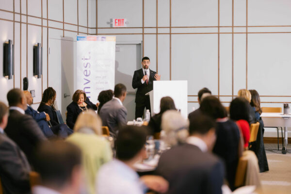 Attendees networking and engaging in conversations during a break at the Community Foundation event focused on diverse investment managers.