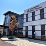 Exterior view of Ascension Saint Thomas New Salem Surgery Center, showcasing modern medical facility design and signage.