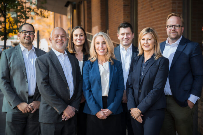 Fortis Law Partners celebrates 10th anniversary with its team of dedicated partners, including (from left to right) David Olsky, Julian Izbiky, Cara Thornton, Julie Herzog, Henry Baskerville, Christine Lamb, and Andrew Comer, highlighting their commitment to legal excellence in Denver.