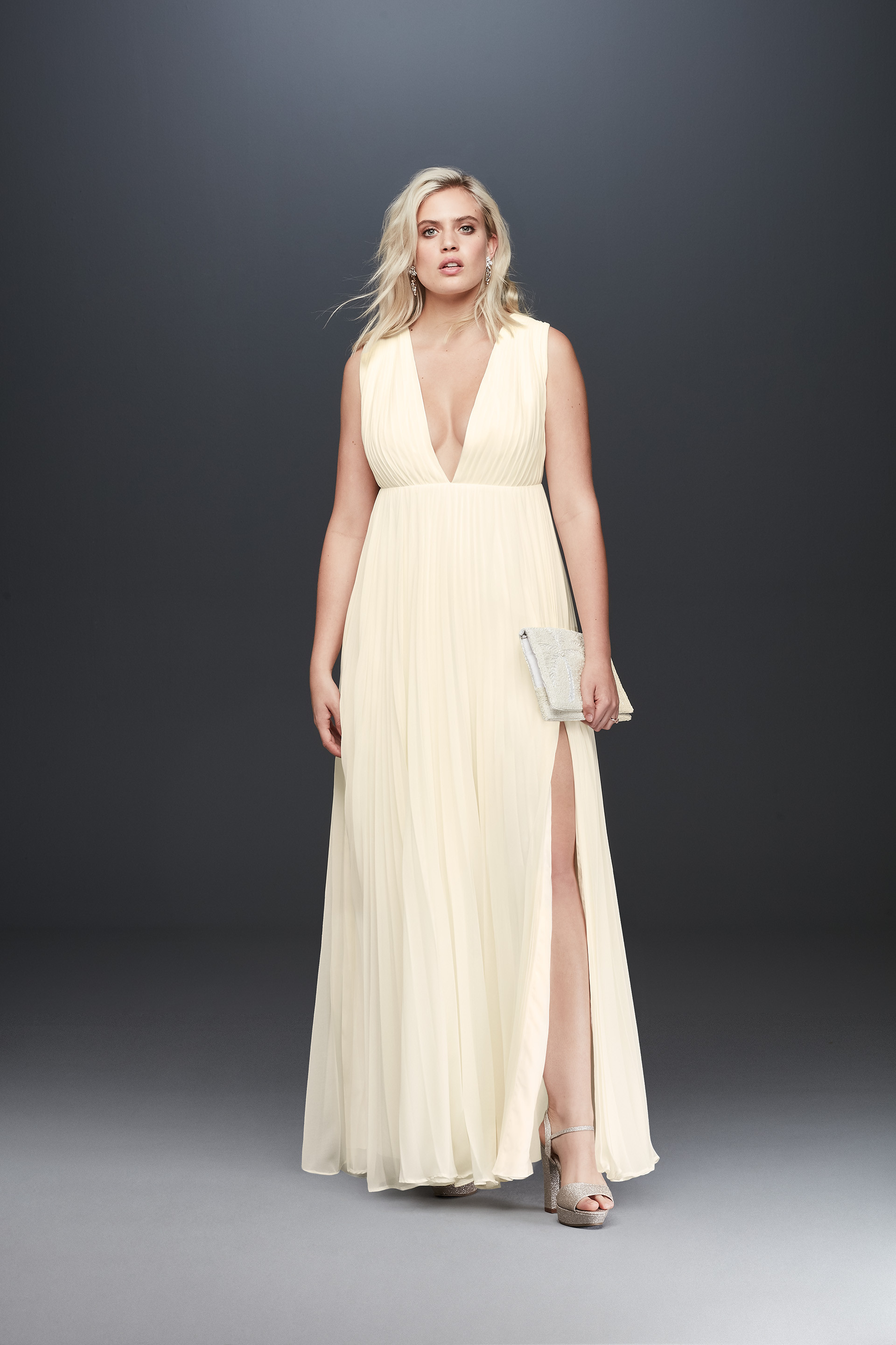 Bride in tank plunging neckline wedding dress, Fame and Partners designer collaboration