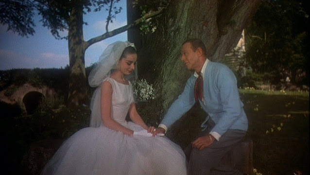 Audrey Hepburn in a wedding dress with Fred Astaire in Funny Face