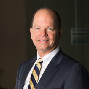 Hank Kelley, CEO of Kelley Commercial Partners, leading Arkansas's premier commercial real estate firm.