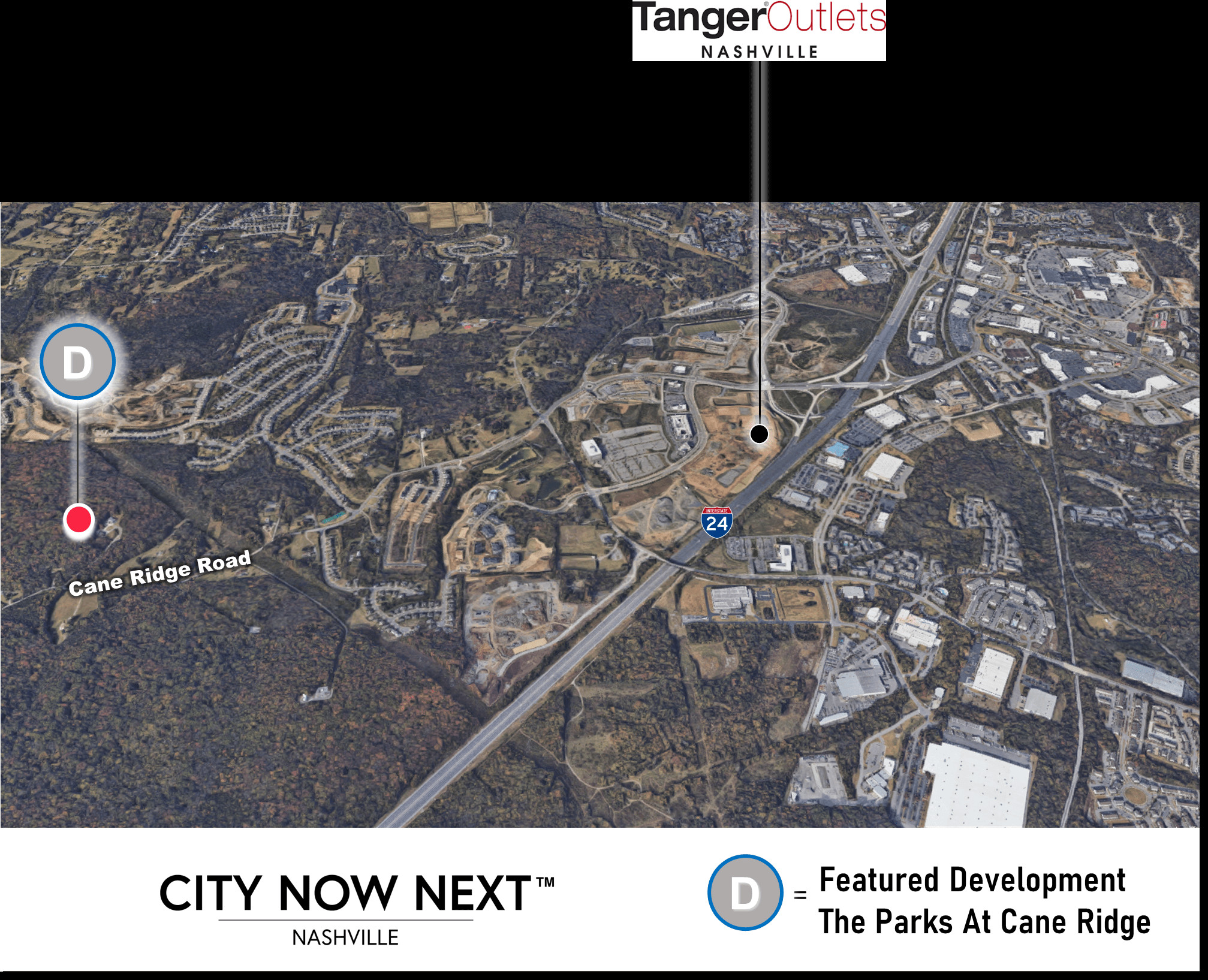 alt text: An aerial view of a residential development with houses and roads.