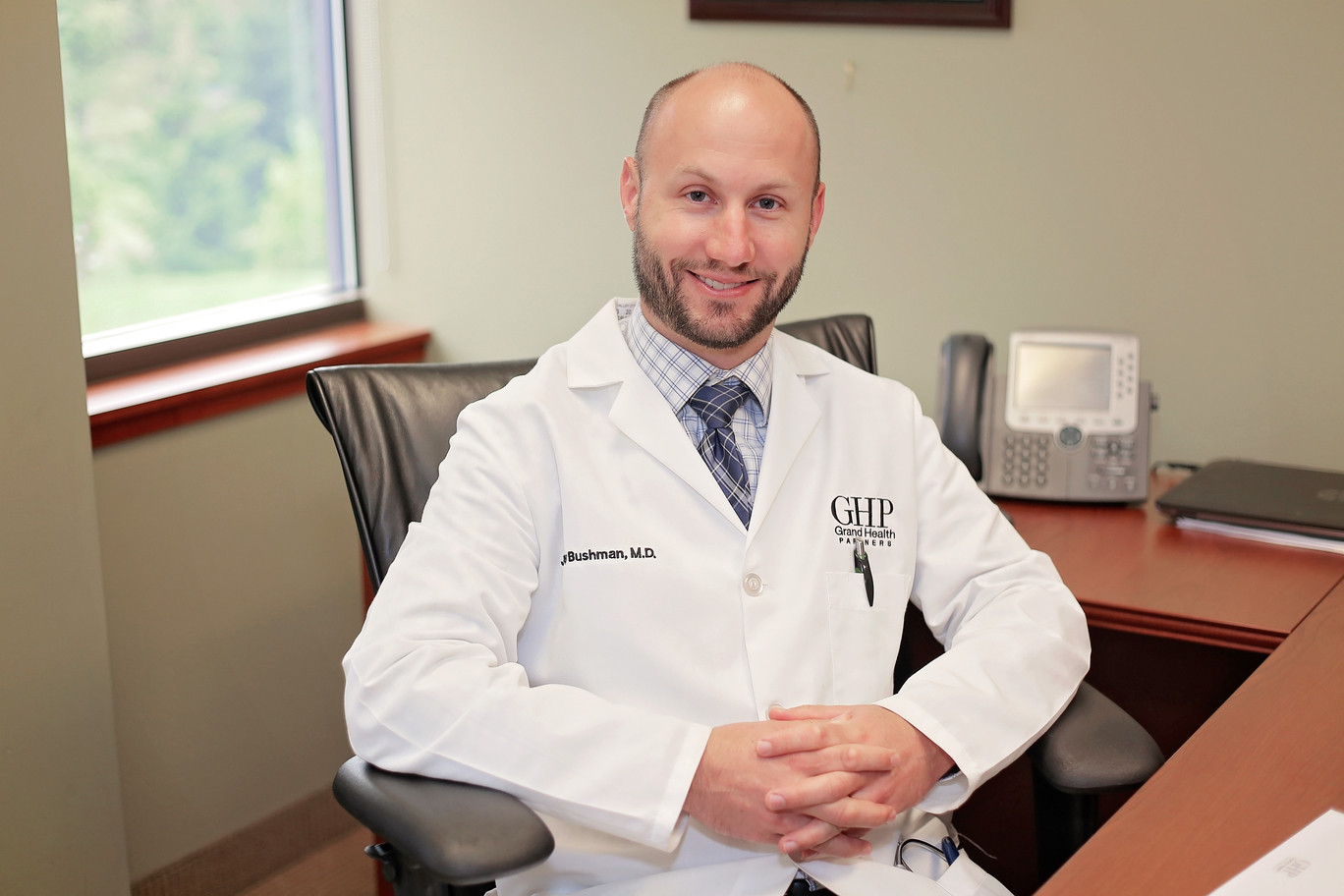 Jeremy Bushman, MD, specializing in reflux disease and bariatric surgery at Grand Health Partners