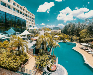 Luxury hotel pool, representing hotel partnerships for earning LifeMiles