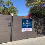 Pardee Properties fence sign in Venice, announcing rebranding from Halton Pardee Partners