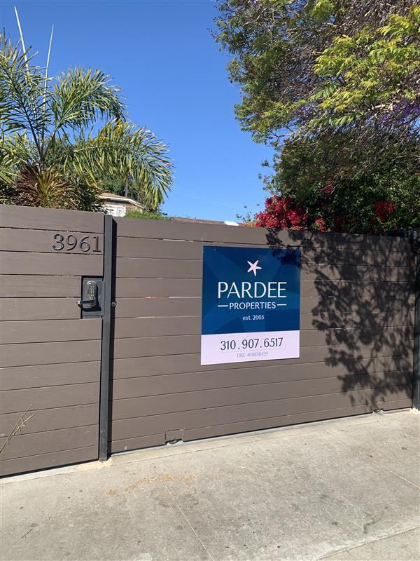 Pardee Properties fence sign in Venice, announcing rebranding from Halton Pardee Partners