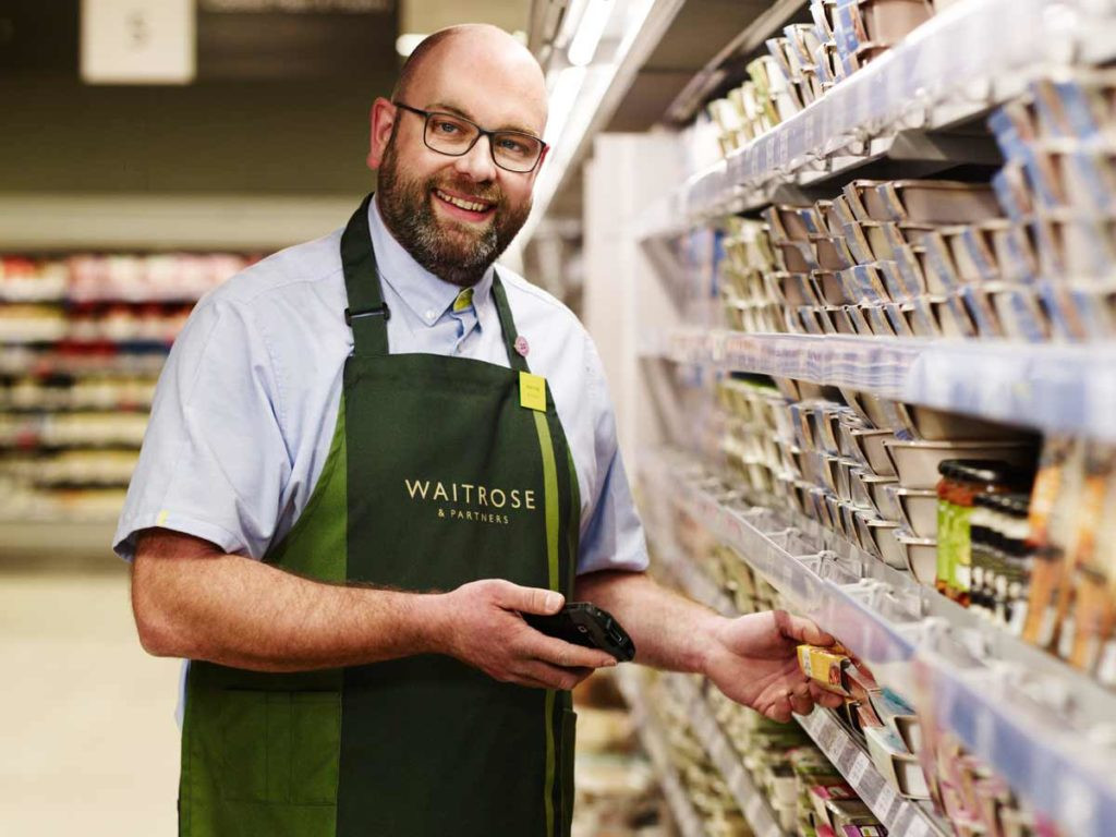 alt text: Fresh produce display in a Little Waitrose & Partners store.