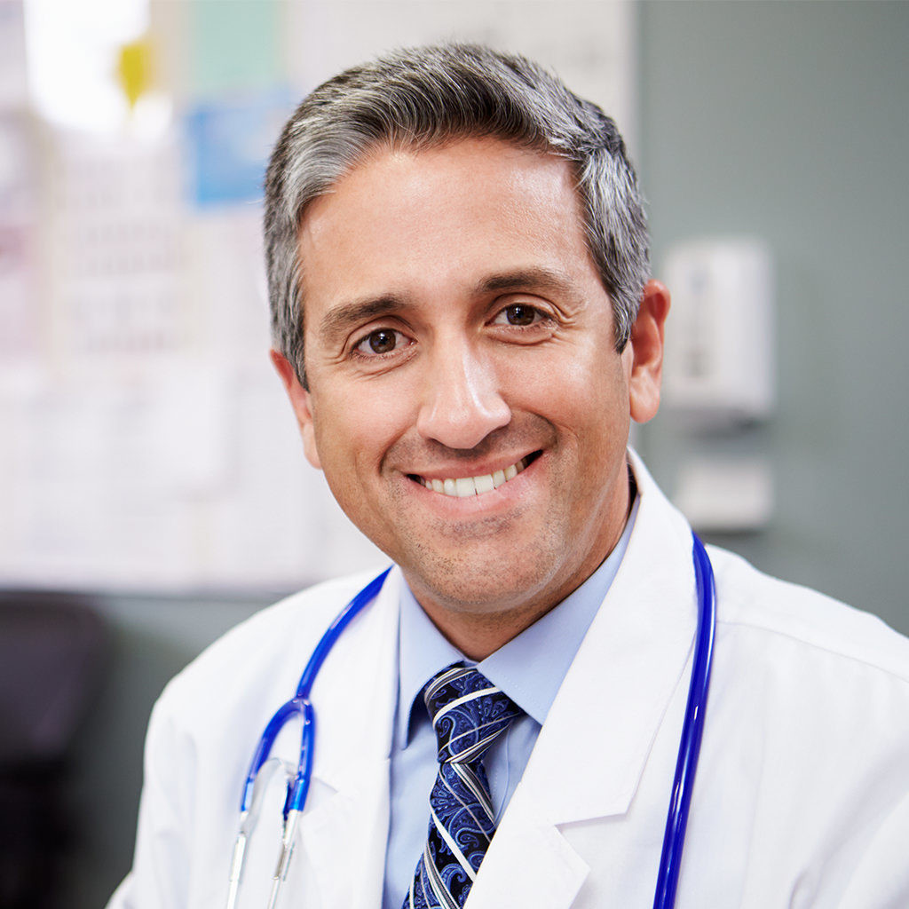 alt text: A group of medical professionals collaborating around a table, discussing patient care.