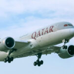 Qatar Airways 787 landing in blue skies in Dhaka, Bangladesh.