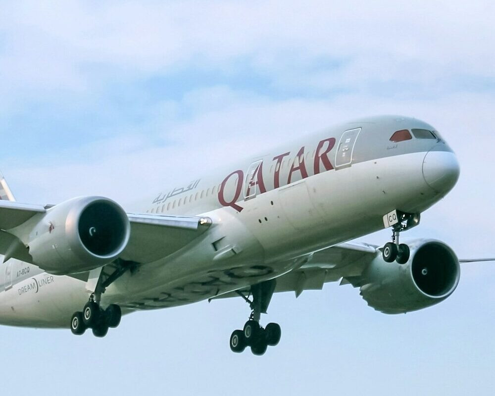 Qatar Airways 787 landing in blue skies in Dhaka, Bangladesh.