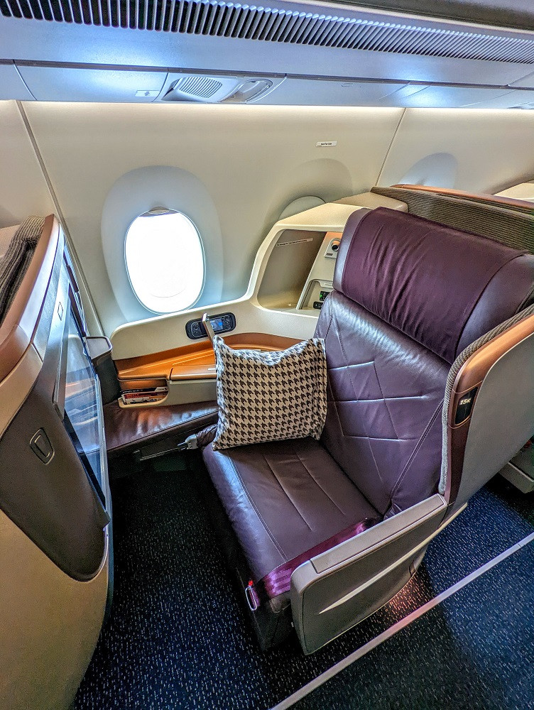 Singapore Airlines Business Class seats on flight SQ24 from Singapore to JFK, showcasing premium cabin comfort.