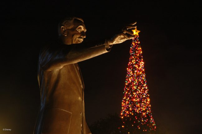 The partners statue with the Christmas tree at Magic Kingdom