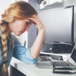 Woman calculating bills