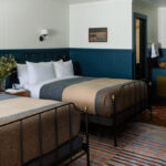 Guest room at Anvil Hotel in Jackson, Wyoming, showcasing the blend of rustic charm and modern design
