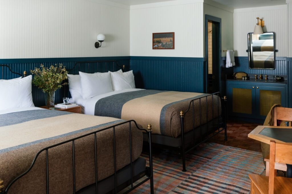 Guest room at Anvil Hotel in Jackson, Wyoming, showcasing the blend of rustic charm and modern design