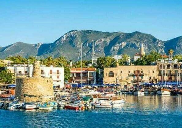 Coastal city in Cyprus with clear blue waters and modern buildings