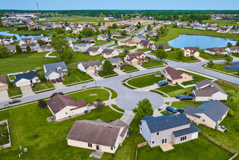Condo community with well-maintained landscaping and common areas, illustrating where condo fees are spent.
