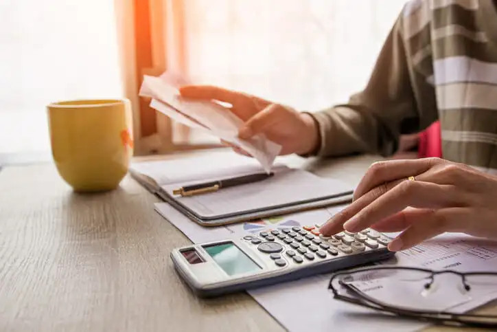 An investor reviewing how to avoid capital gains taxes on land sale