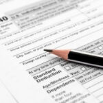 landlord filing out tax documents