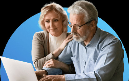 Couple reviewing information on laptop together