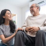 Woman assisting senior woman