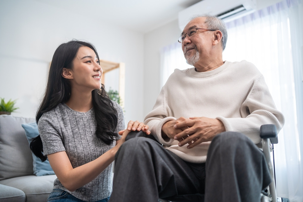 Woman assisting senior woman
