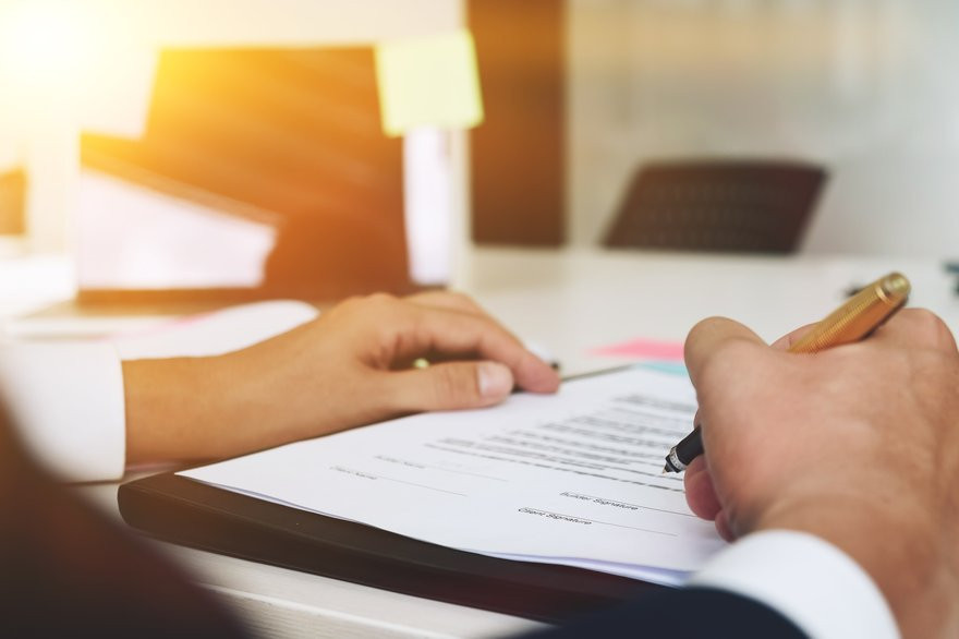 Businesswoman examining income statement