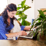 Woman reviewing 1099 form at home