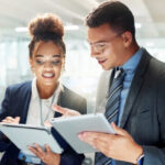 Man and woman analyzing the different types of income streams