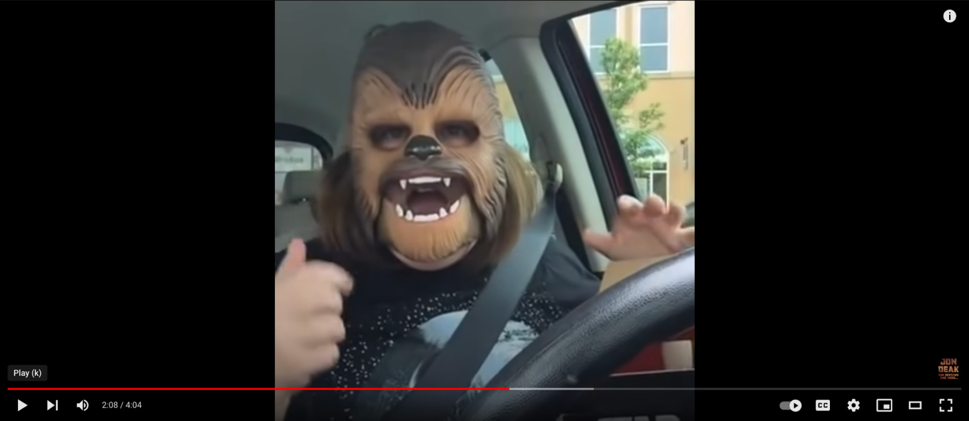A woman in a Chewbacca mask on youtube video emphasizing the potential for viral content