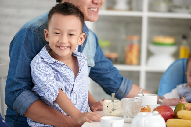 Family discussing financial matters around a table