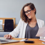 Woman calculating annual income