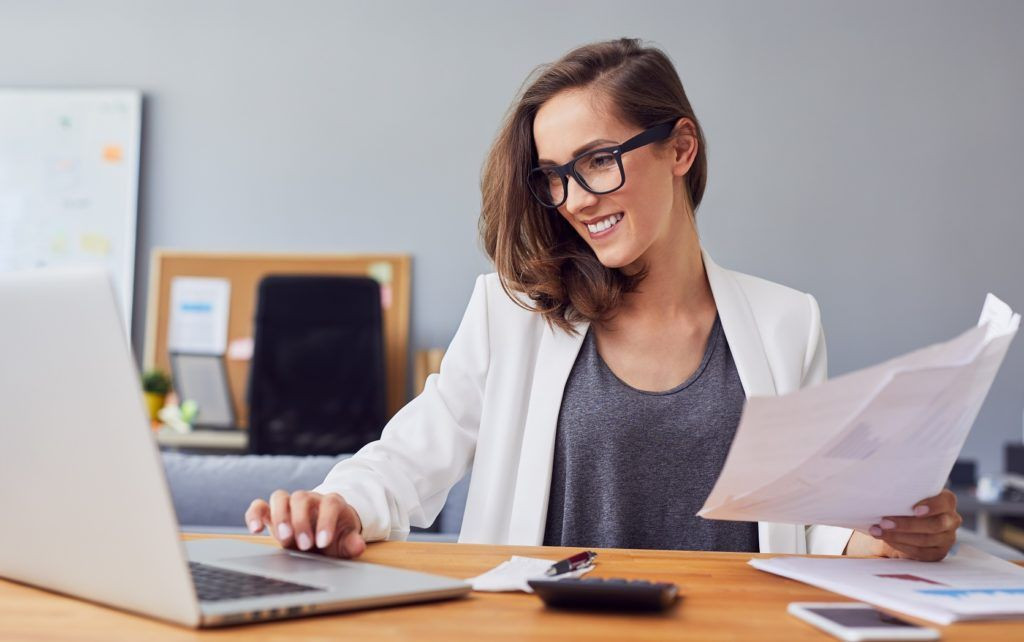 Woman calculating annual income