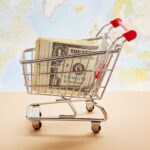 Shopping Cart Filled with US Currency