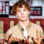 Mason Thames sings Stevie Wonder in Incoming, with a high school background