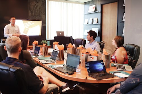 Group of people discussing financial strategies